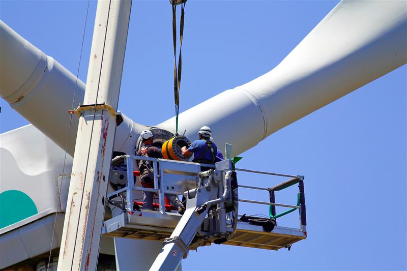 person working on a turbine